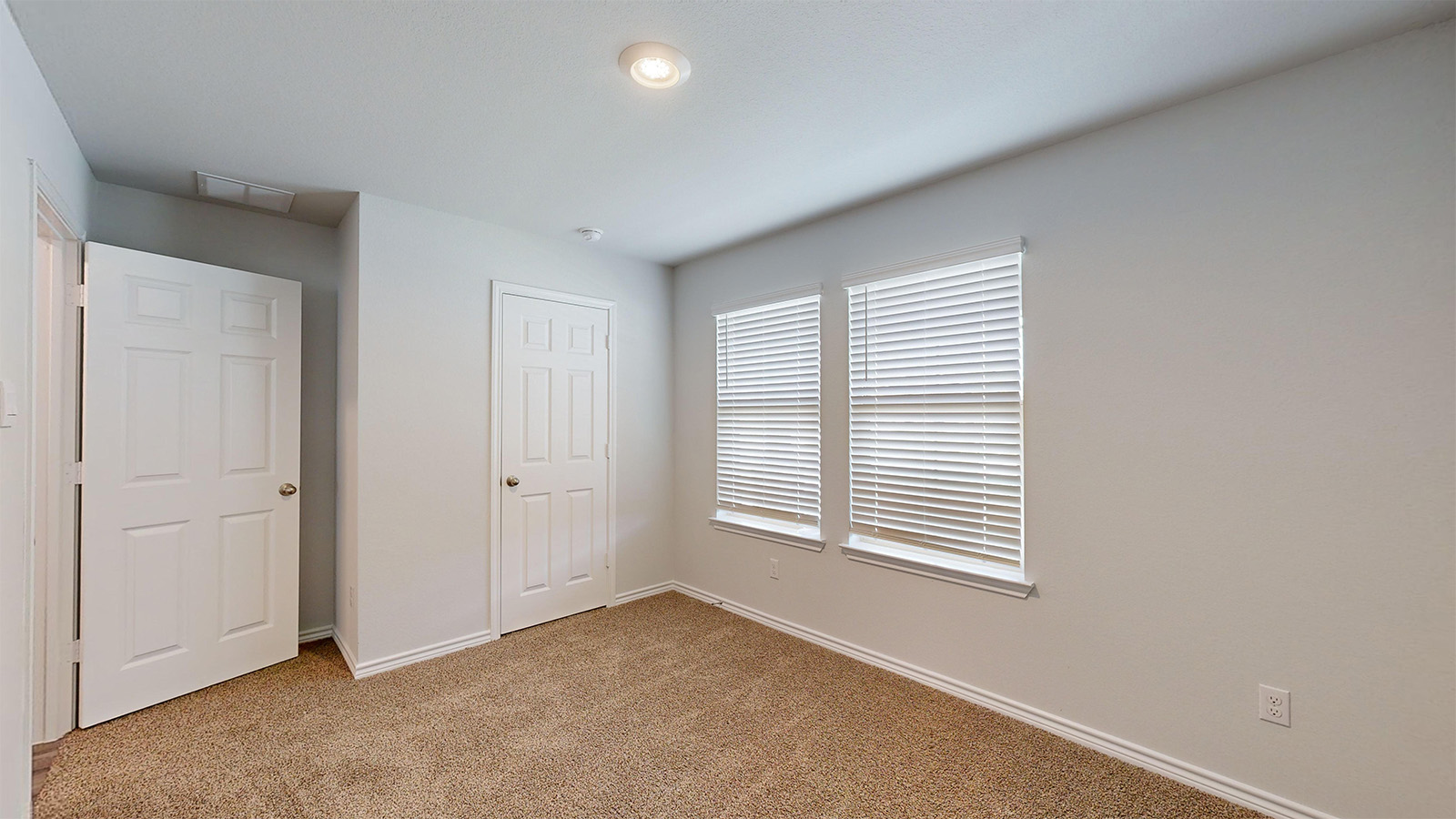 242 Water Wl Road Burnet, TX 78611 - Photo 18 of 21 a view of an empty room with a window