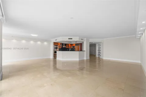 a kitchen with stainless steel appliances granite countertop a sink and stove top oven