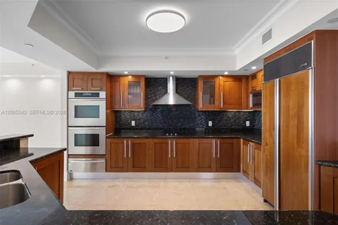 a view of a storage and utility room in a kitchen