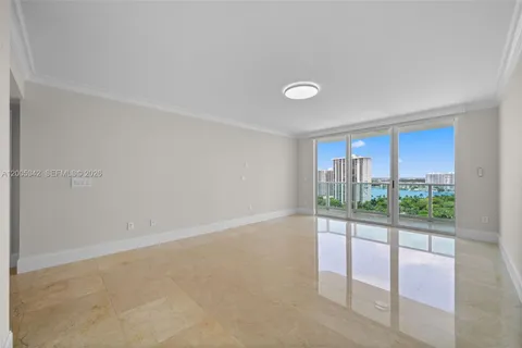 a bathroom with a shower and a glass door