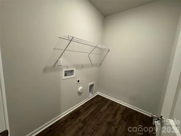 a view of small space with racks on the wall