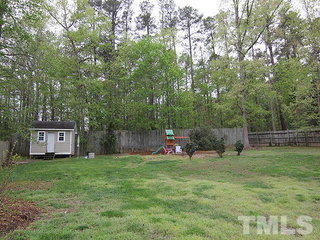 5412 Middleton Road Durham, NC 27713 - Photo 14 of 18 a view of a chairs and table in the yard
