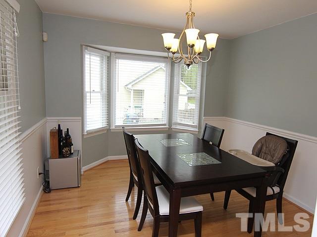 5412 Middleton Road Durham, NC 27713 - Photo 17 of 18 a view of a dining room with furniture and window
