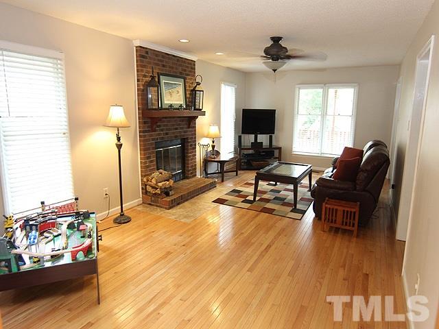 5412 Middleton Road Durham, NC 27713 - Photo 3 of 18 a living room with furniture fireplace and a window