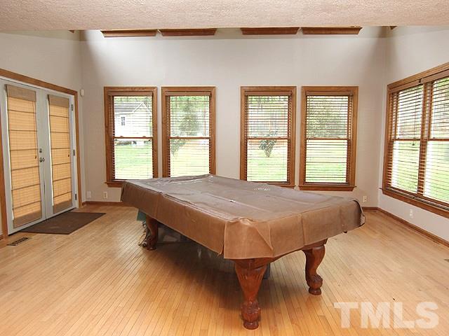 5412 Middleton Road Durham, NC 27713 - Photo 6 of 18 a bed sitting in a spacious bedroom next to a window