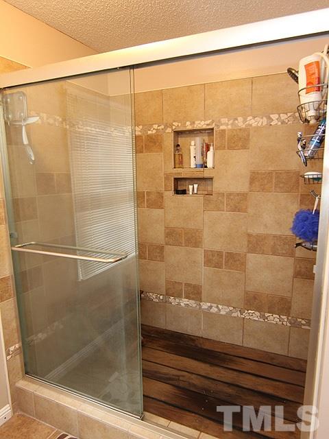 5412 Middleton Road Durham, NC 27713 - Photo 7 of 18 a bathroom with a shower