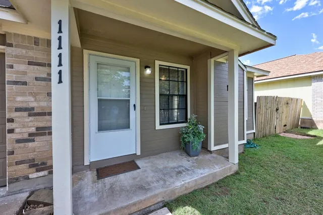 a view of a porch with seating space