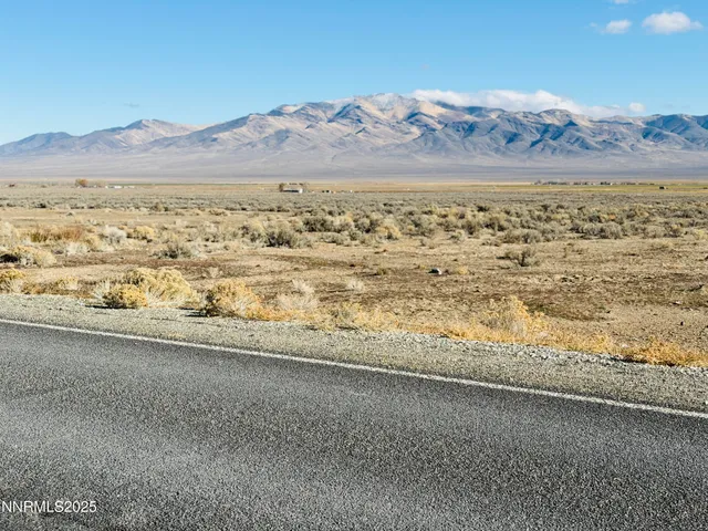 a view of an ocean and mountain