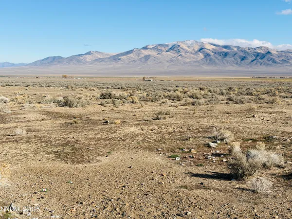 a view of ocean and a mountain