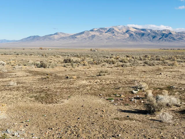 a view of ocean and a mountain