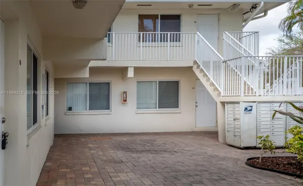 a view of an entryway with a house
