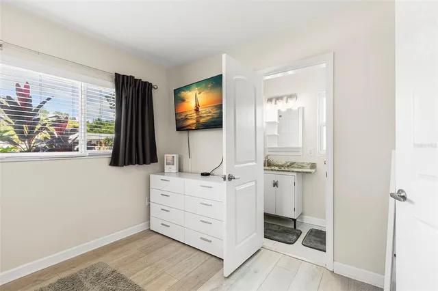 a living room with furniture and flat screen tv