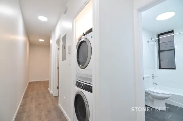 a bathroom with a toilet and a sink