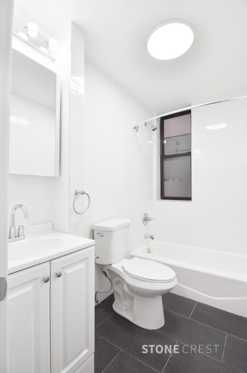 550 Riverside Drive, Unit 23 Manhattan, NY 10027 - Photo 6 of 7 a bathroom with a sink toilet and mirror