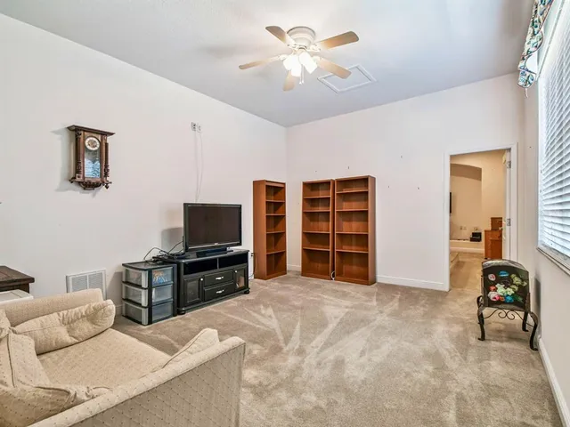 a view of a workspace with furniture