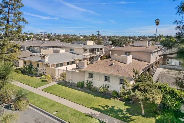 an aerial view of a house with a garden