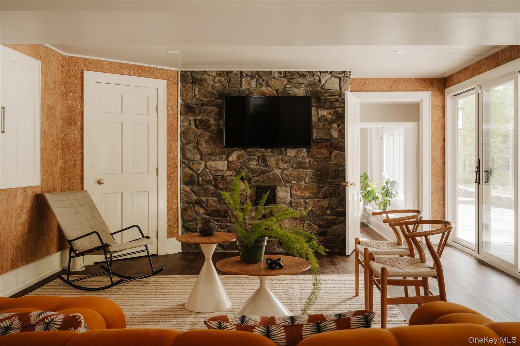 1046 Bulls Head Road Clinton Corners, NY 12514 - Photo 24 of 46 a living room with furniture and a fireplace