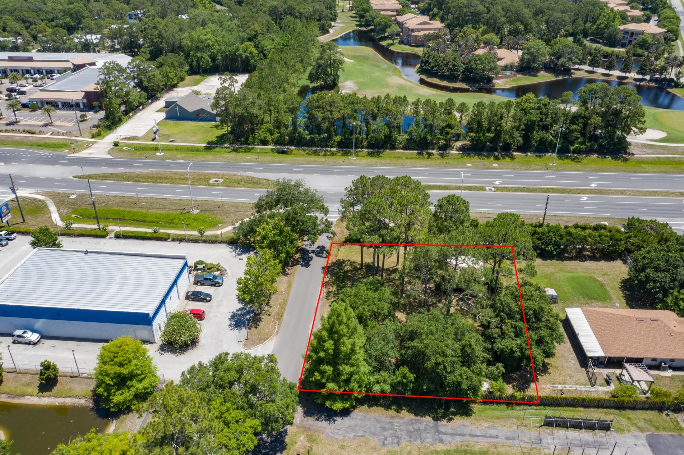 0 North 2nd Street St. Augustine, FL 32084 - Photo 5 of 14 a view of a swimming pool and trees in the background