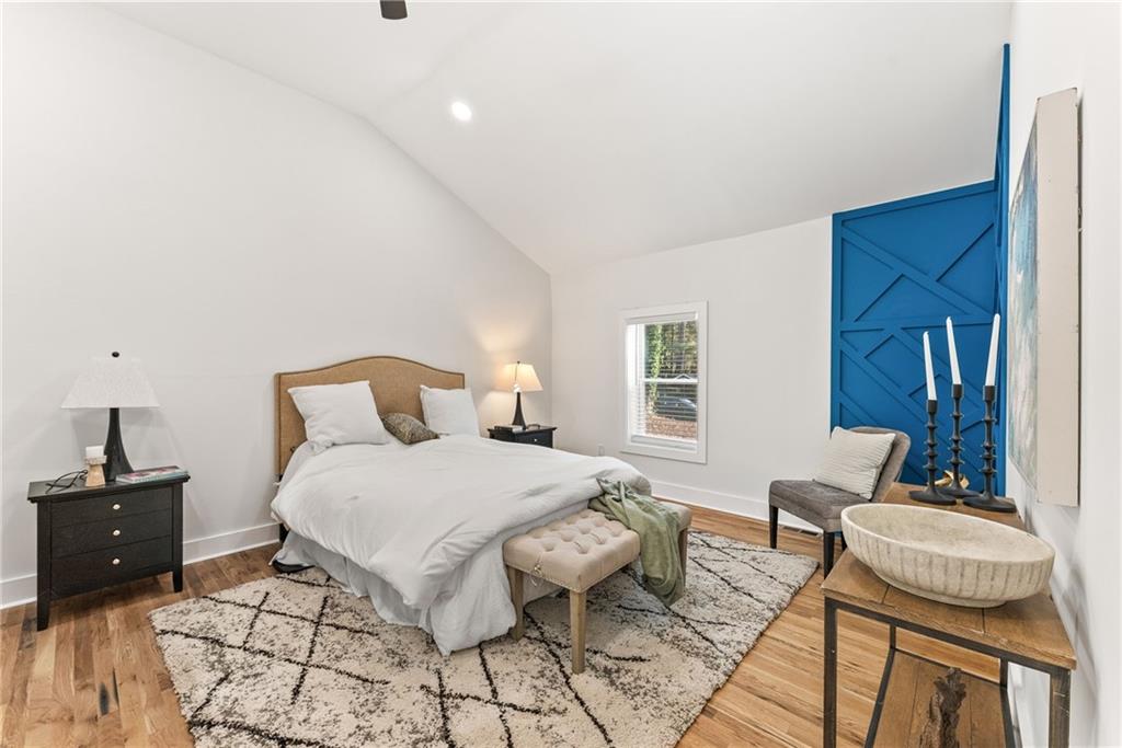 3372 Jackson Drive Decatur, GA 30032 - Photo 11 of 26 a bedroom with a bed and wooden floor