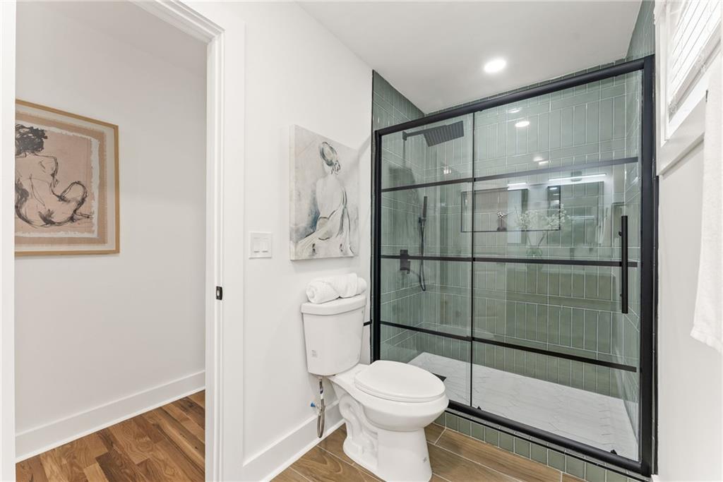 3372 Jackson Drive Decatur, GA 30032 - Photo 13 of 26 a bathroom with a toilet and a shower