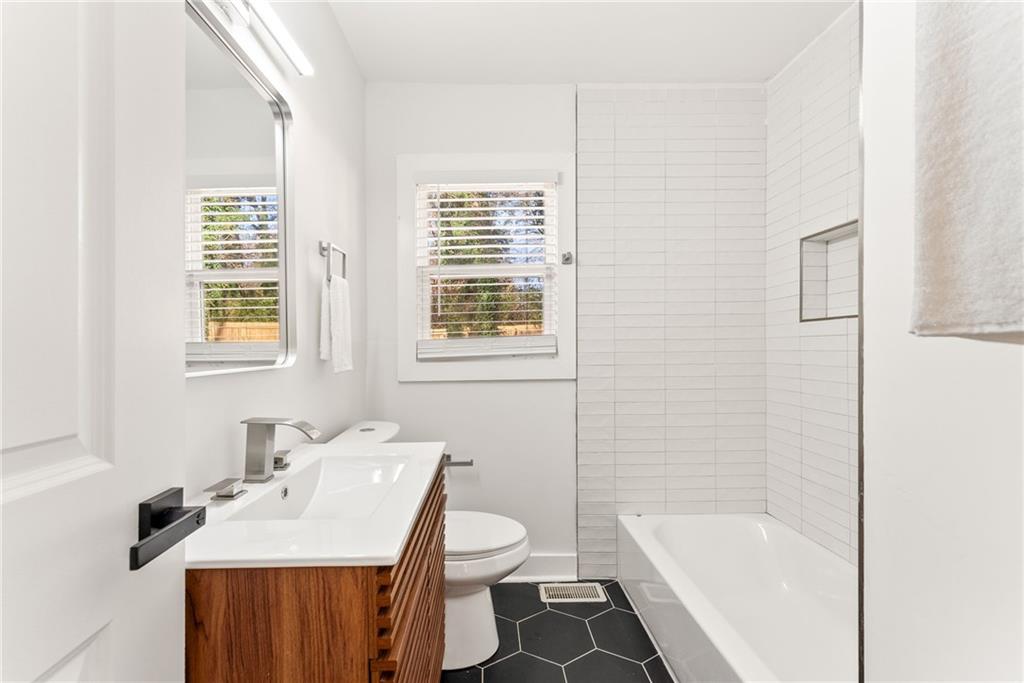 3372 Jackson Drive Decatur, GA 30032 - Photo 15 of 26 a bathroom with a sink toilet tub and shower