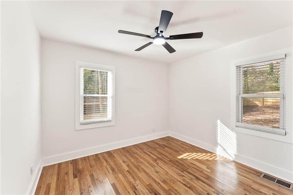 3372 Jackson Drive Decatur, GA 30032 - Photo 16 of 26 a view of a room with wooden floor and a window