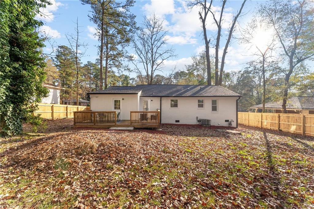 3372 Jackson Drive Decatur, GA 30032 - Photo 19 of 26 a front view of a house with a yard