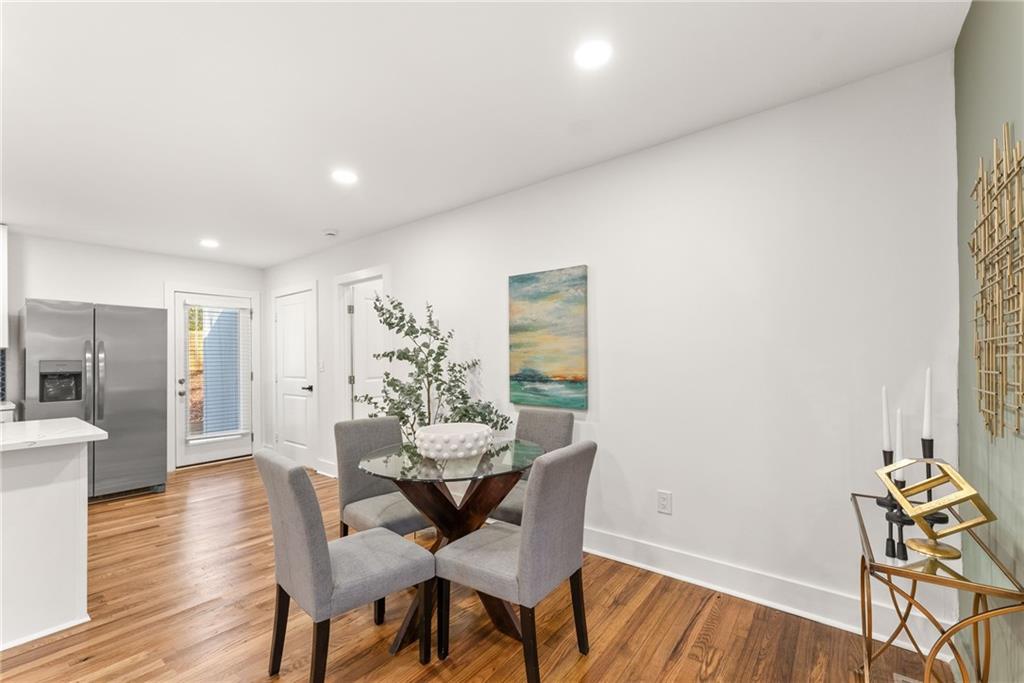 3372 Jackson Drive Decatur, GA 30032 - Photo 7 of 26 a view of a dining room with furniture and wooden floor