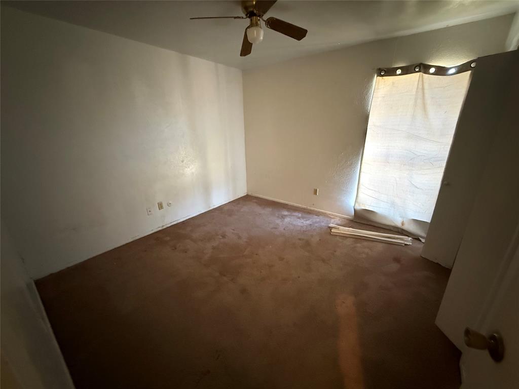 1334 Rutherford Drive Mesquite, TX 75149 - Photo 16 of 22 an empty room with a window