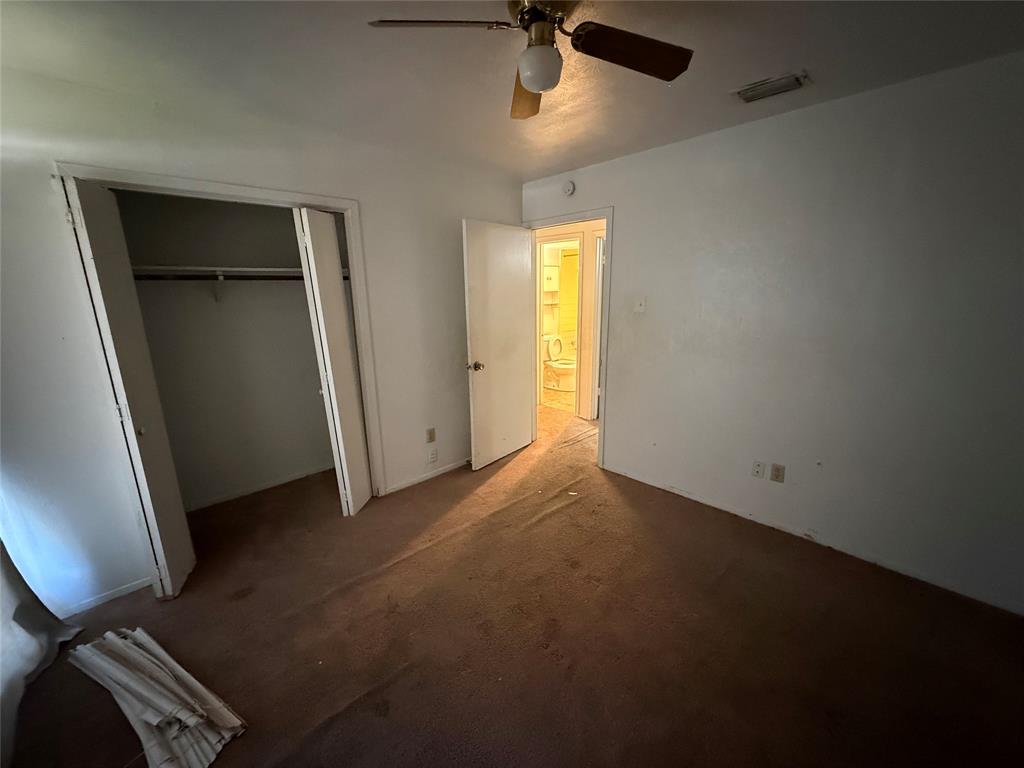 1334 Rutherford Drive Mesquite, TX 75149 - Photo 17 of 22 a view of empty room with windows