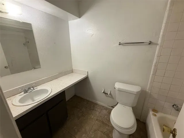 a bathroom with a sink and a shower