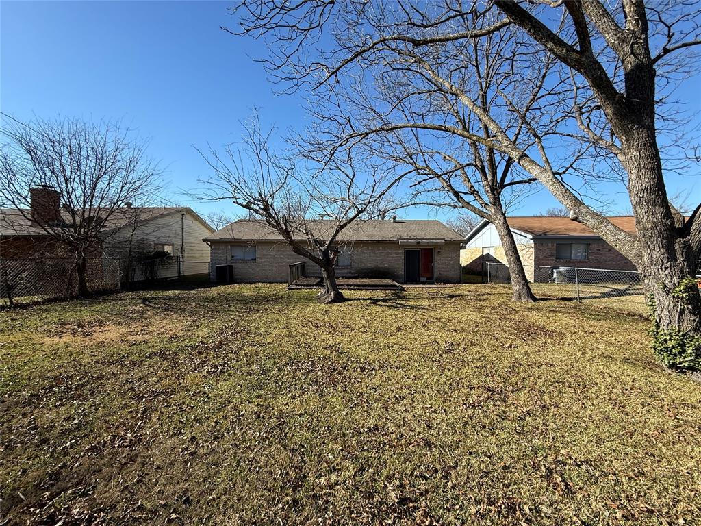 1334 Rutherford Drive Mesquite, TX 75149 - Photo 4 of 22 a view of a house with a yard