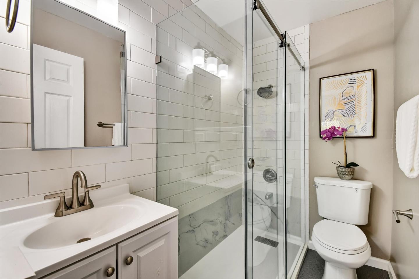 324 Holloway Avenue San Francisco, CA 94112 - Photo 31 of 37 a bathroom with a sink toilet and shower