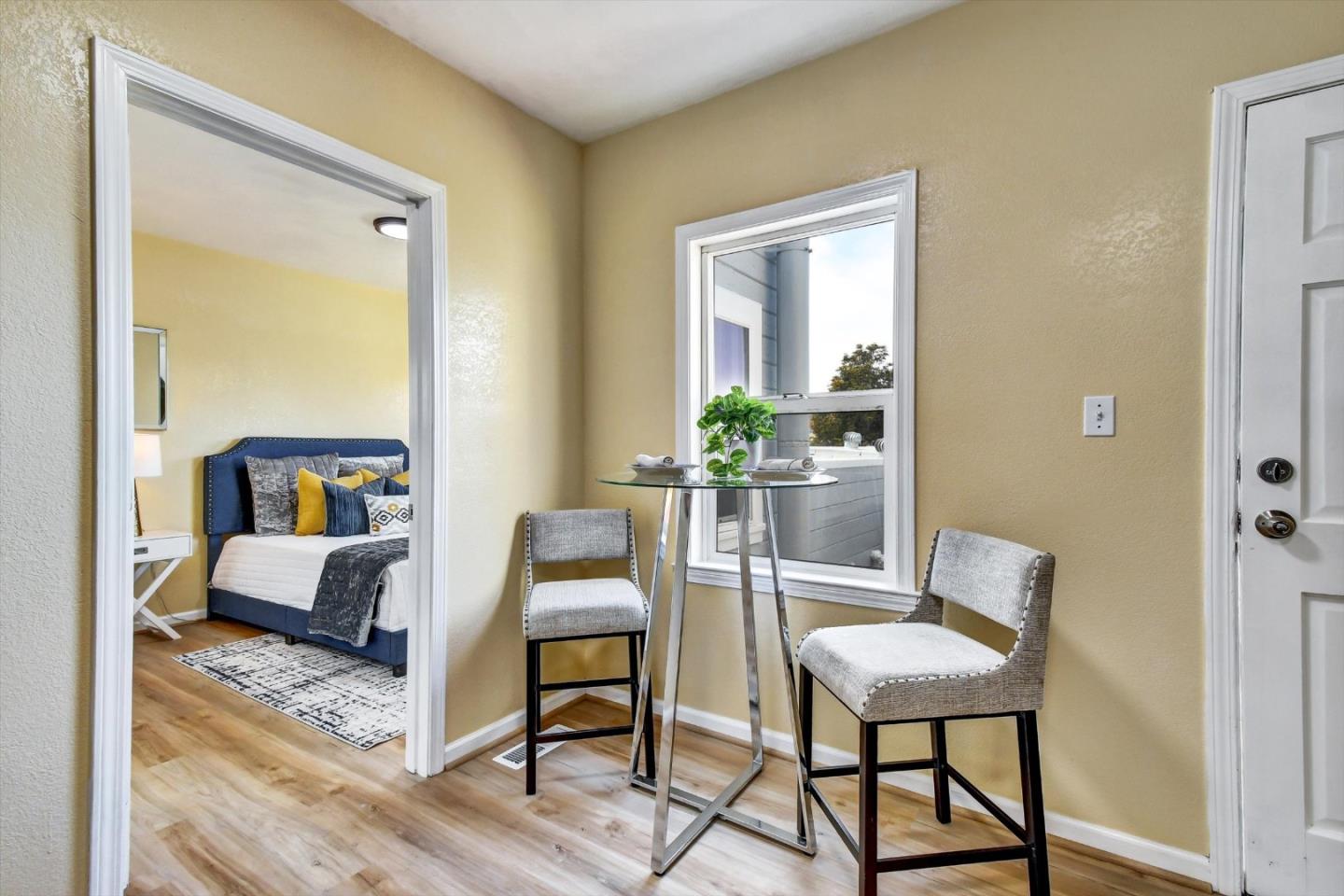 324 Holloway Avenue San Francisco, CA 94112 - Photo 6 of 37 a view of a livingroom with furniture and wooden floor
