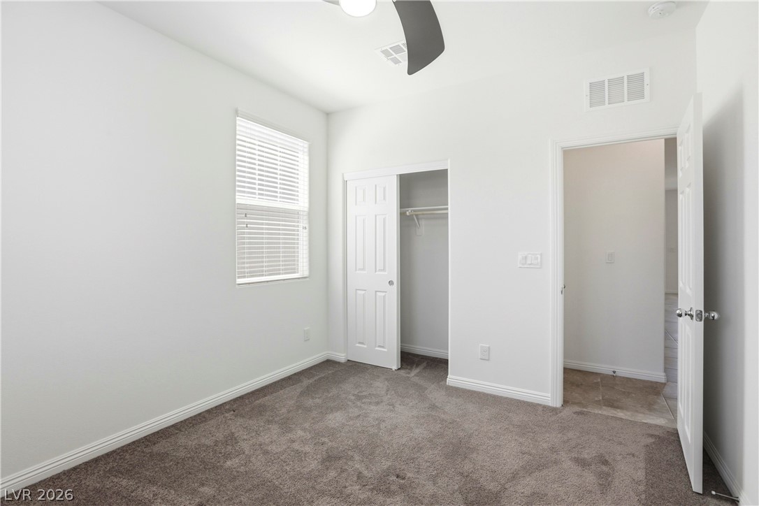 461 Ylang Place Henderson, NV 89015 - Photo 26 of 35 Bedroom 2 closet and entrance