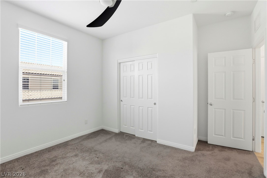461 Ylang Place Henderson, NV 89015 - Photo 28 of 35 Bedroom 3 closet & extrance
