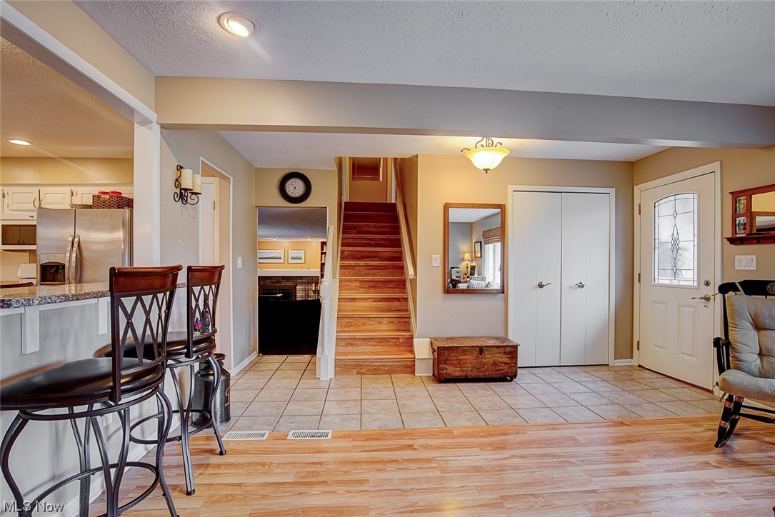 31950 Cannon Road Solon, OH 44139 - Photo 8 of 33 Foyer featuring a textured ceiling and light tile floors