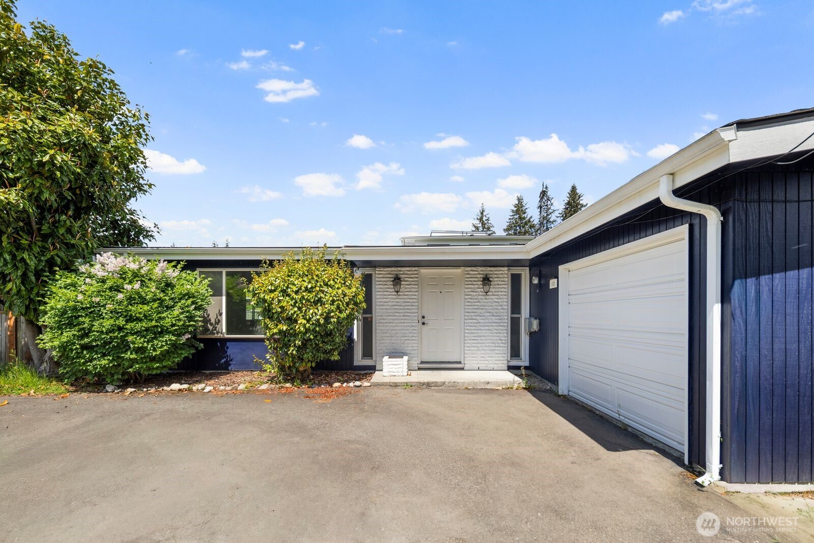 101 161st Street Southeast Bothell, WA 98012 - Photo 4 of 34 a view of a house with a outdoor space