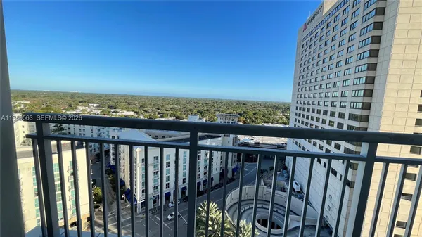 a view of a balcony with an outdoor space