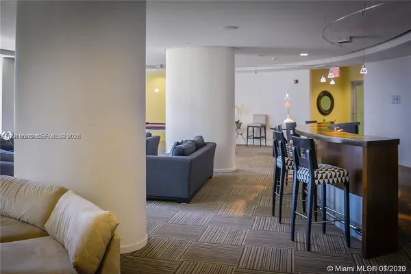 a view of a balcony with chairs