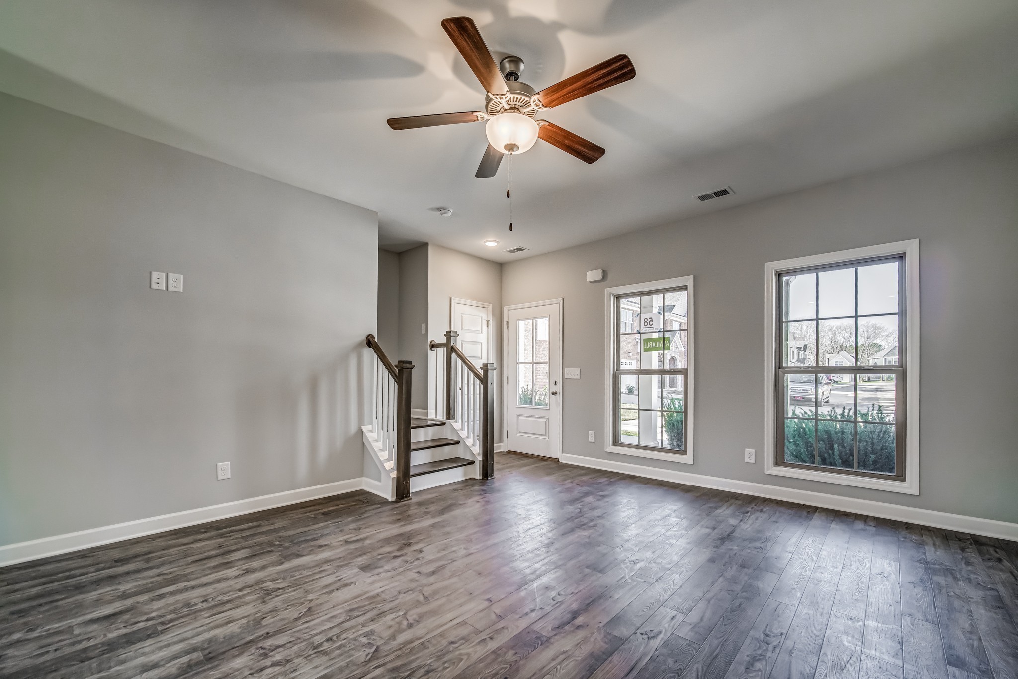 1750 Fenway Loop Antioch, TN 37013 - Photo 11 of 15 wooden floor in an empty room with a window