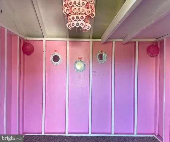 a view of a kitchen with red door