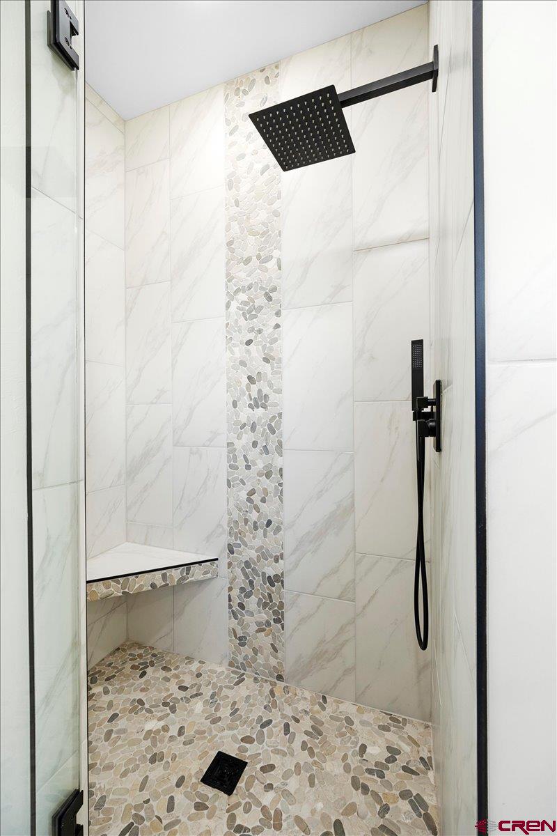 62774 Jacob Road Montrose, CO 81401 - Photo 24 of 35 a bathroom with a shower
