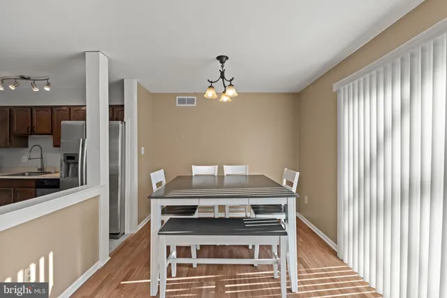 a kitchen with a stove and a refrigerator
