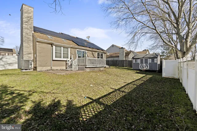a house view with garden space
