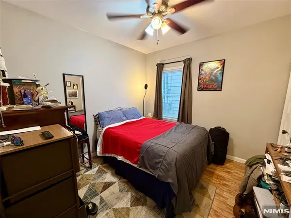 a bedroom with a bed and a closet