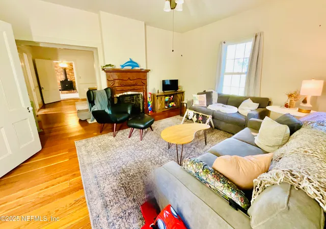 a living room with a rug