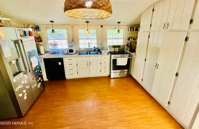 a bathroom with a sink and toilet