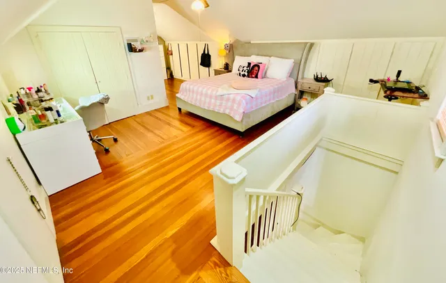 a view of a house with a yard and garage