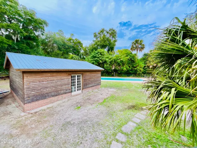 a view of parking garage with cars